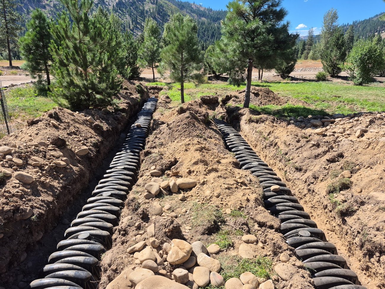 Drainfield chamber lines laid in a trench for a new septic system